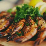 Grilled tiger shrimp served with parsley and lemon